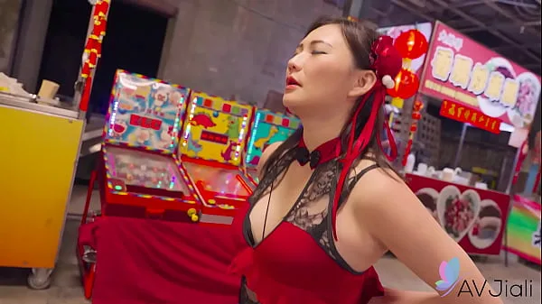 Japanese beauty Mio seduced by a mysterious stranger in a bustling alleyway.